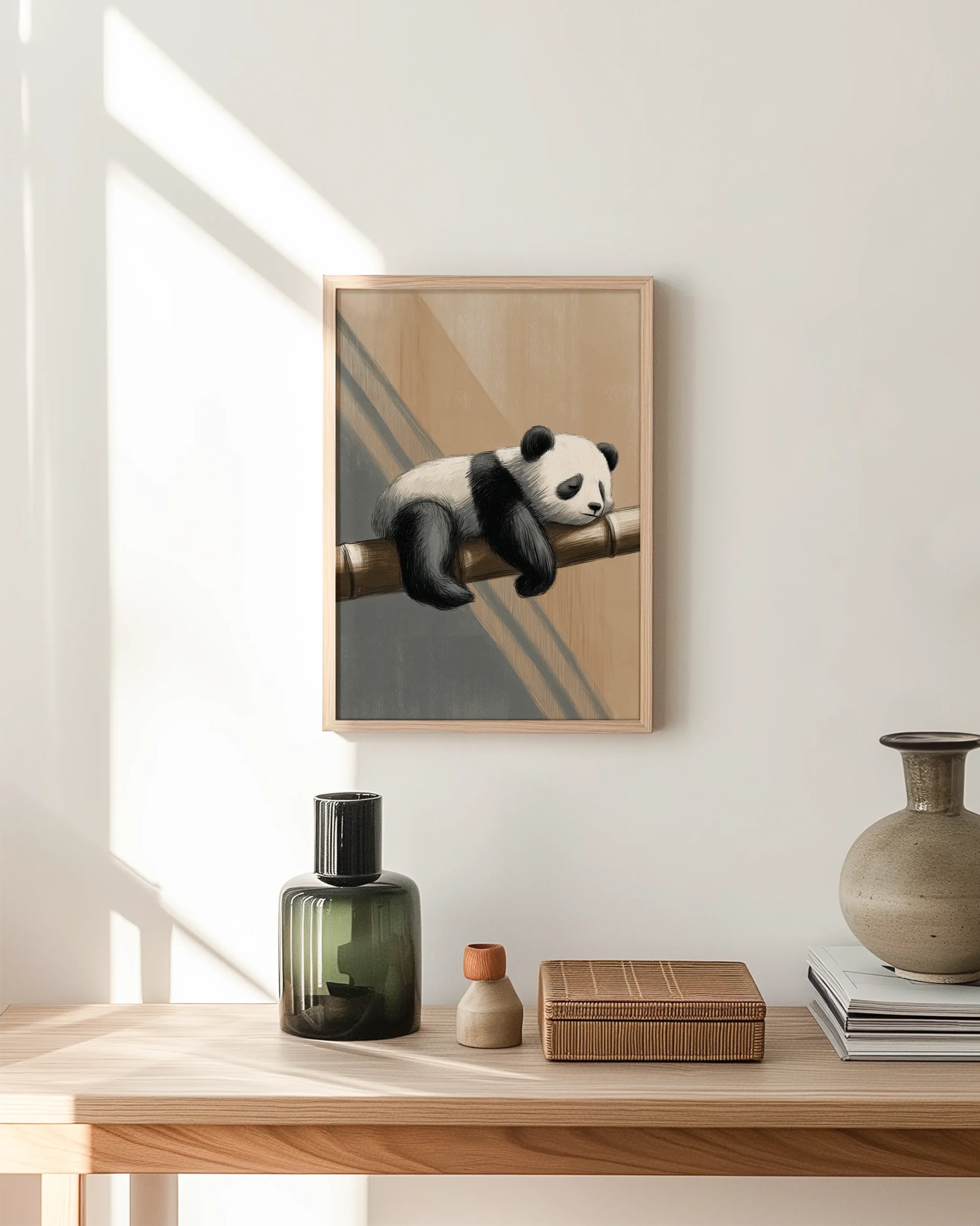 A1 framed poster of a sleeping panda lying on a bamboo branch in warm neutral Japandi colors, displayed on a bright hallway wall.
