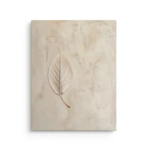 Delicate skeleton leaf centered on a warm beige plaster texture background in a minimalist wabi sabi style printed on premium thin canvas wall art.