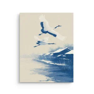 Two white cranes flying over a snowy winter river with blue riverside houses in a Japanese inspired Ukiyo e style on premium thin canvas wall art.
